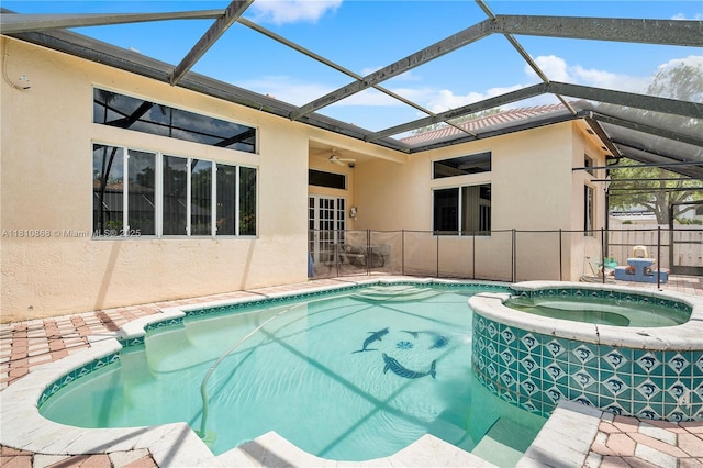 1357 Camellia Ln, Weston, FL 33326 - view of swimming pool with a pool with connected hot tub, a lanai, a ceiling fan, and a patio area