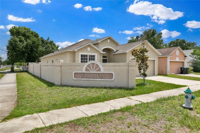 7974 Niagara Falls Ct, Orlando, FL 32825 - community / neighborhood sign featuring driveway and an attached garage