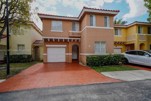 14816 SW 104th St Unit 85, Miami, FL 33196 - multi unit property featuring a tiled roof, an attached garage, and stucco siding