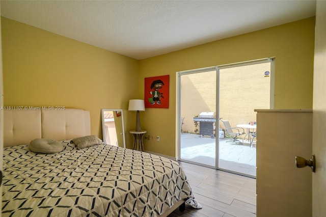 14816 SW 104th St Unit 85, Miami, FL 33196 - bedroom featuring access to exterior and wood finished floors