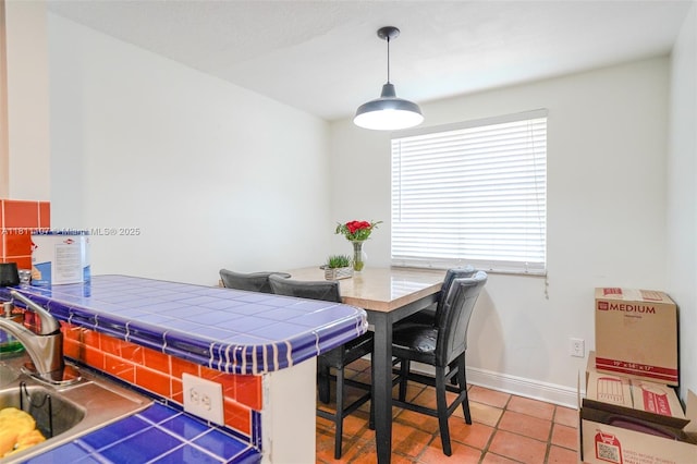 14816 SW 104th St Unit 85, Miami, FL 33196 - dining space with tile patterned flooring and baseboards