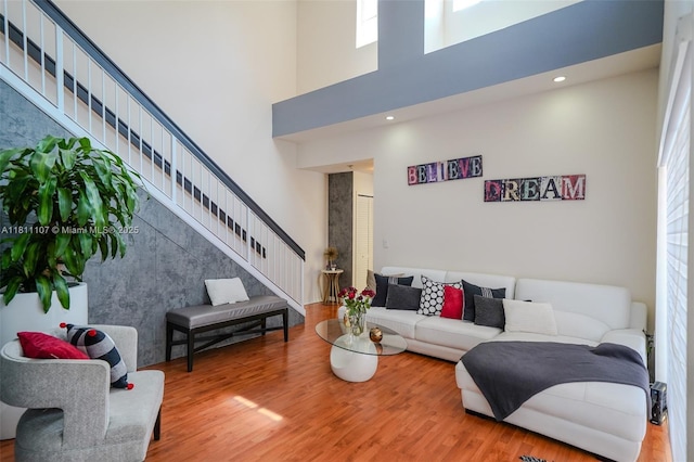 14816 SW 104th St Unit 85, Miami, FL 33196 - living area featuring a high ceiling, wood finished floors, and stairs