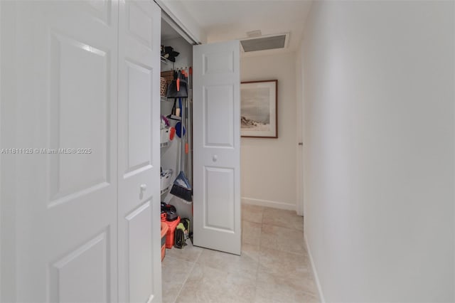 1950 S Ocean Dr Unit 14G, Hallandale Beach, FL 33009 - hallway featuring light tile patterned floors and baseboards
