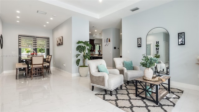 19120 SW 127th Pl, Miami, FL 33177 - living room with light marble finish floors, recessed lighting, and baseboards