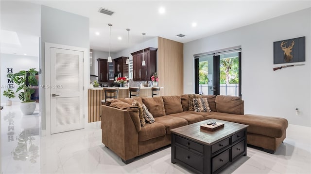 19120 SW 127th Pl, Miami, FL 33177 - living room with light marble finish floors and recessed lighting