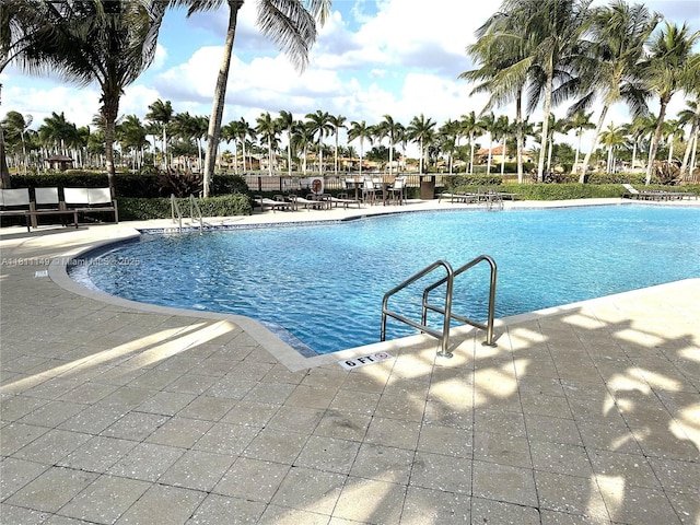 15222 SW 30th Ter, Miami, FL 33185 - community pool with a patio area