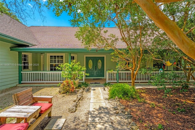 15820 SW 250th St, Homestead, FL 33031 - view of front facade featuring a porch and a shingled roof