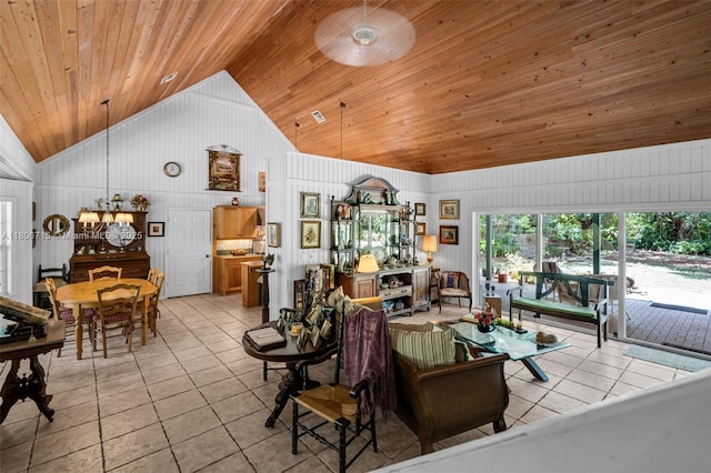 15820 SW 250th St, Homestead, FL 33031 - living room with wood ceiling, light tile patterned floors, a chandelier, high vaulted ceiling, and wooden walls