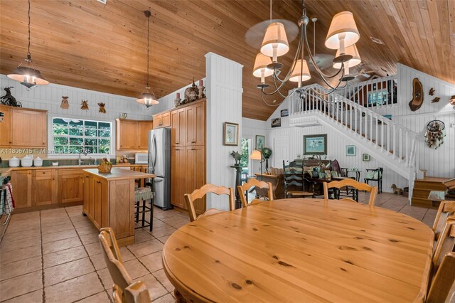 15820 SW 250th St, Homestead, FL 33031 - dining area featuring lofted ceiling, stairway, wooden ceiling, light tile patterned floors, and a chandelier