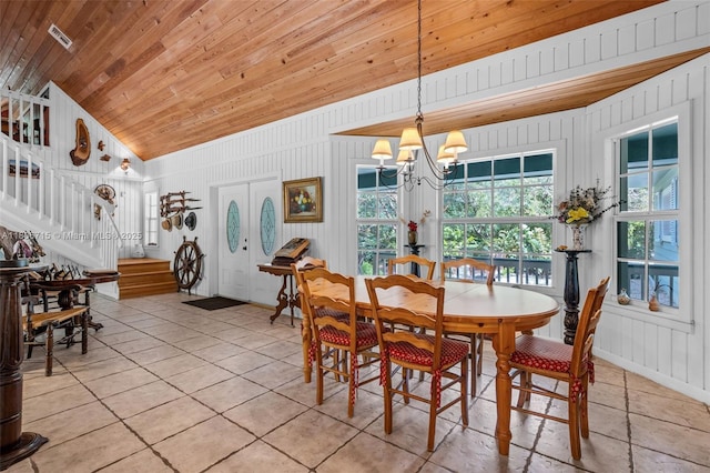 15820 SW 250th St, Homestead, FL 33031 - dining area with stairway, light tile patterned floors, vaulted ceiling, a chandelier, and wooden ceiling