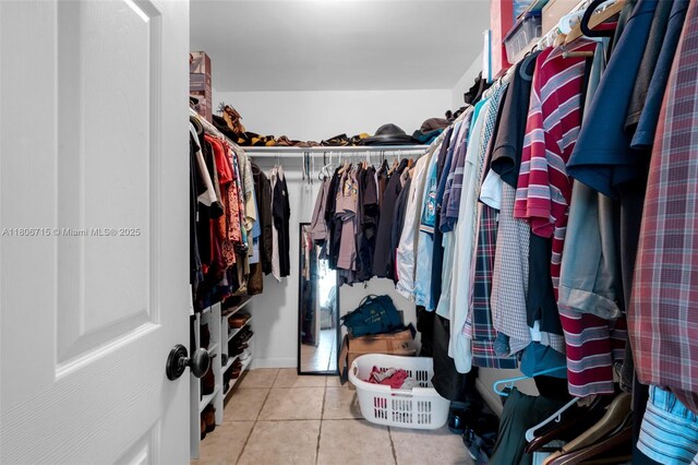 15820 SW 250th St, Homestead, FL 33031 - spacious closet featuring tile patterned flooring