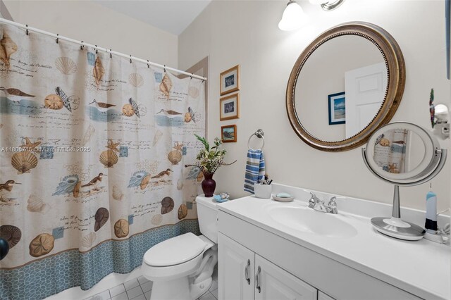 15820 SW 250th St, Homestead, FL 33031 - full bathroom with toilet, vanity, tile patterned flooring, and a shower with shower curtain