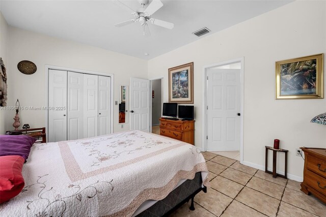 15820 SW 250th St, Homestead, FL 33031 - bedroom featuring light tile patterned floors, a closet, baseboards, and a ceiling fan