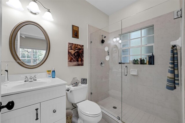 15820 SW 250th St, Homestead, FL 33031 - bathroom with vanity, toilet, and a stall shower