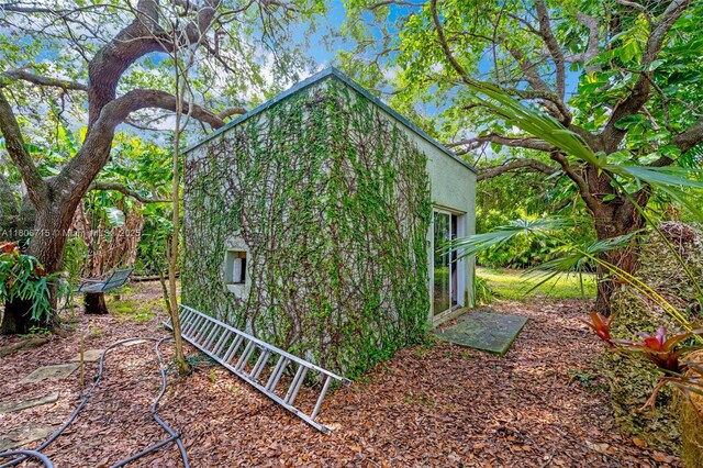 15820 SW 250th St, Homestead, FL 33031 - view of side of home featuring stucco siding
