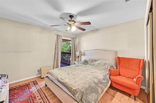 863 W Coco Plum Cir, Plantation, FL 33324 - bedroom with access to exterior, baseboards, light wood finished floors, and ceiling fan