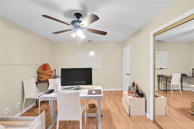 863 W Coco Plum Cir, Plantation, FL 33324 - home office featuring light wood-style floors, a ceiling fan, and baseboards
