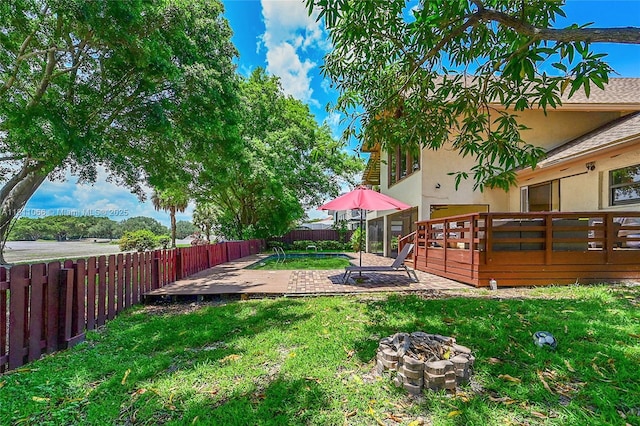863 W Coco Plum Cir, Plantation, FL 33324 - view of yard with a fire pit, a patio area, and a deck