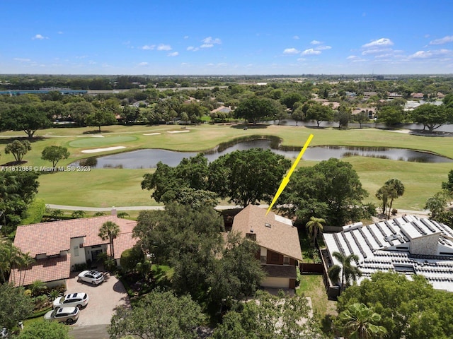 863 W Coco Plum Cir, Plantation, FL 33324 - bird's eye view of a golf club, a nearby body of water, and a tree filled landscape