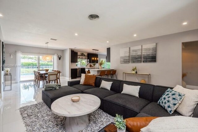 7625 SW 108th Ter, Pinecrest, FL 33156 - living room featuring recessed lighting