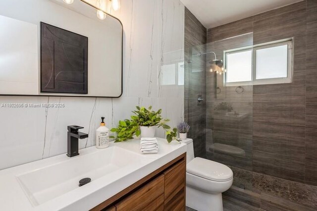 7625 SW 108th Ter, Pinecrest, FL 33156 - bathroom with toilet, vanity, and walk in shower
