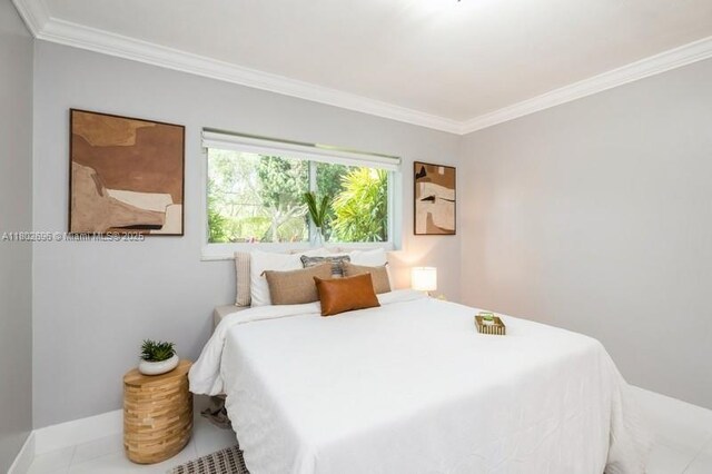 7625 SW 108th Ter, Pinecrest, FL 33156 - bedroom with ornamental molding and baseboards