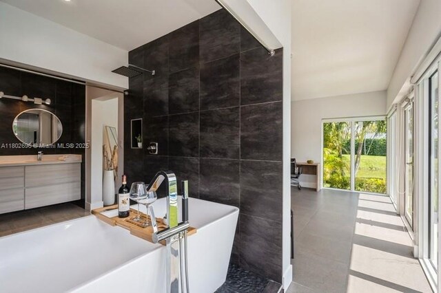 7625 SW 108th Ter, Pinecrest, FL 33156 - full bath featuring tile walls, vanity, a freestanding bath, and tiled shower