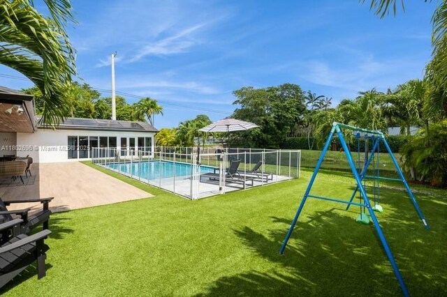 7625 SW 108th Ter, Pinecrest, FL 33156 - view of swimming pool featuring a patio area