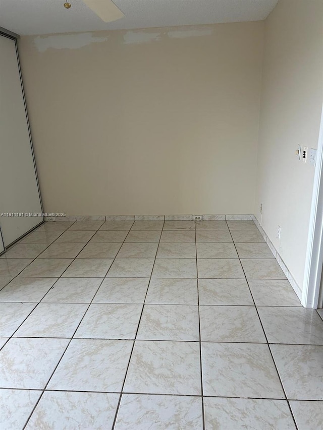 850 SW 133rd Ter Unit 416B, Pembroke Pines, FL 33027 - spare room with light tile patterned floors
