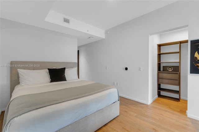 398 NE 5th St Unit 3803, Miami, FL 33132 - bedroom featuring light wood-style floors and baseboards