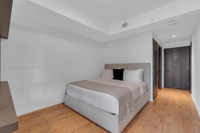 398 NE 5th St Unit 3803, Miami, FL 33132 - bedroom with light wood finished floors, recessed lighting, and baseboards