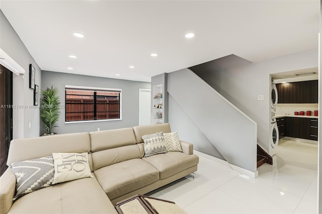 6967 SW 115th Pl Unit B34, Miami, FL 33173 - living room featuring stacked washing machine and dryer, stairs, and recessed lighting