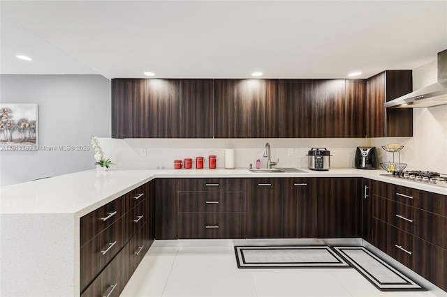6967 SW 115th Pl Unit B34, Miami, FL 33173 - kitchen with modern cabinets, a sink, stainless steel gas cooktop, dark brown cabinetry, and recessed lighting