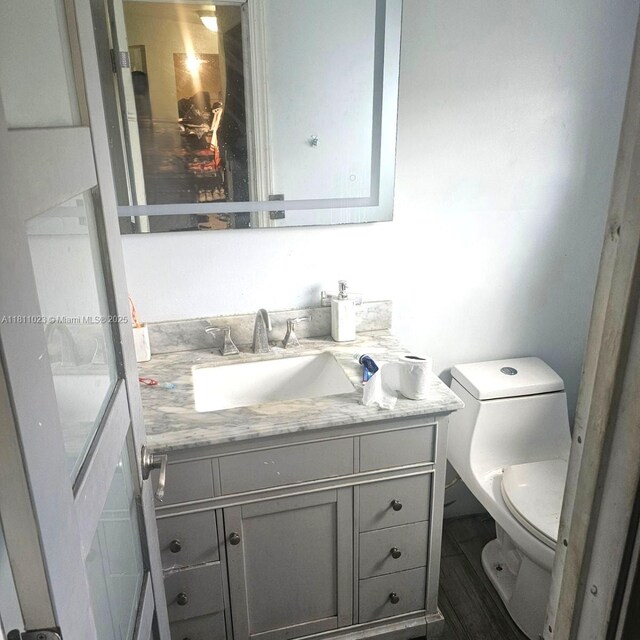 2211 Rutland St, Opa Locka, FL 33054 - half bath with vanity and toilet