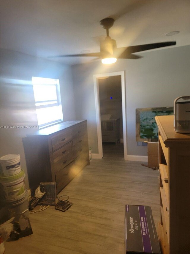 2211 Rutland St, Opa Locka, FL 33054 - hall with light wood-type flooring and baseboards