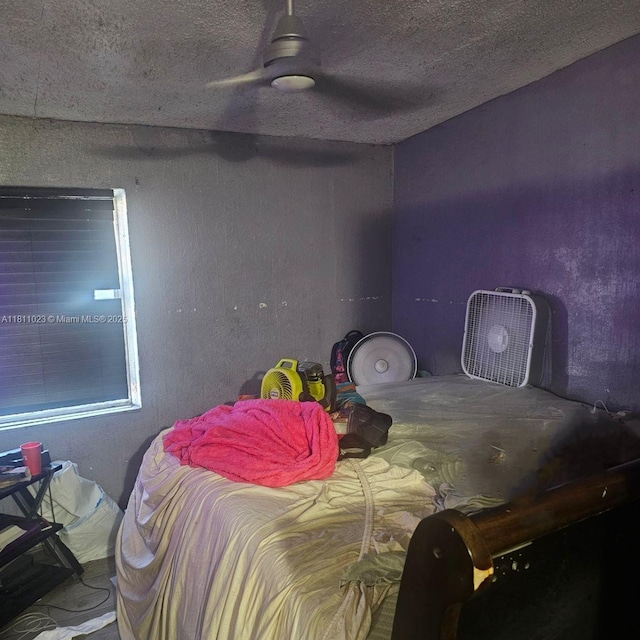 2211 Rutland St, Opa Locka, FL 33054 - bedroom featuring a ceiling fan and a textured ceiling