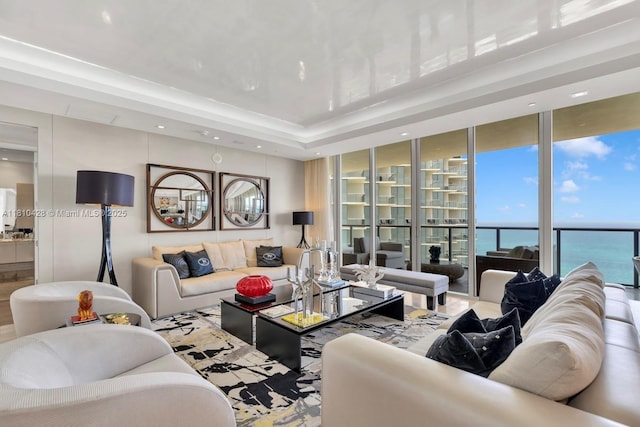 9701 Collins Ave Unit 2403S, Bal Harbour, FL 33154 - living room featuring a water view, floor to ceiling windows, and recessed lighting