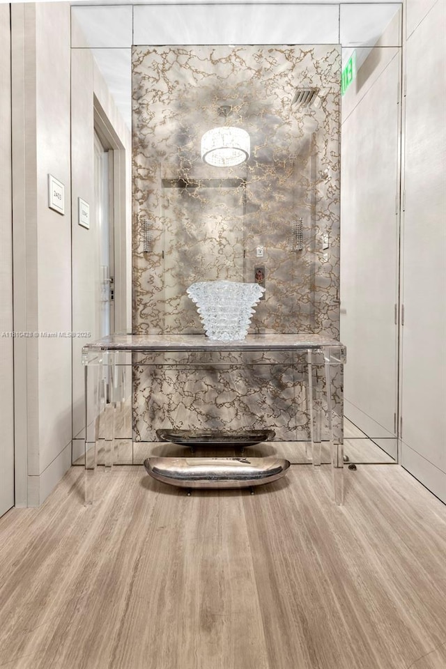 9701 Collins Ave Unit 2403S, Bal Harbour, FL 33154 - bathroom featuring wood finished floors