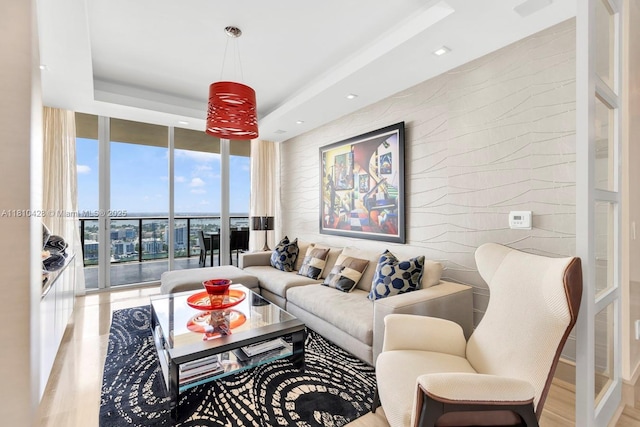 9701 Collins Ave Unit 2403S, Bal Harbour, FL 33154 - living room with a wall of windows, recessed lighting, and a raised ceiling