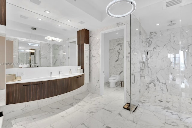 9701 Collins Ave Unit 2403S, Bal Harbour, FL 33154 - bathroom with a marble finish shower, toilet, marble tiled flooring, double vanity, and stone wall