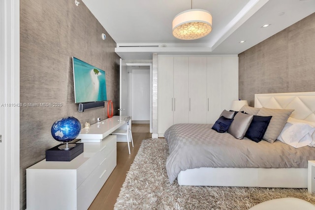 9701 Collins Ave Unit 2403S, Bal Harbour, FL 33154 - bedroom with wood finished floors