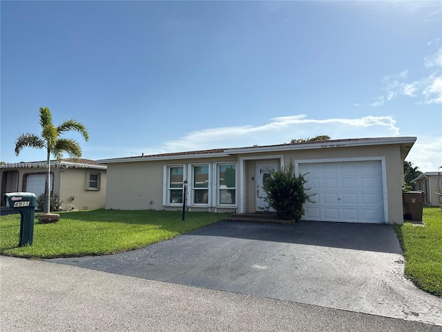 4911 NW 14th Ave, Deerfield Beach, FL 33064 - ranch-style home with stucco siding, a garage, driveway, and a front lawn