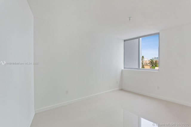 488 NE 18th St Unit 501, Miami, FL 33132 - empty room featuring fire sprinkler in ceiling and baseboards