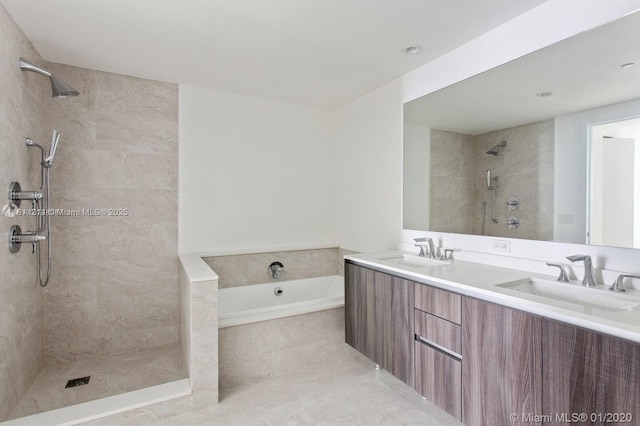 488 NE 18th St Unit 501, Miami, FL 33132 - bathroom featuring tiled shower, a bath, and double vanity