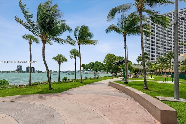 488 NE 18th St Unit 501, Miami, FL 33132 - view of home's community with a water view and a lawn