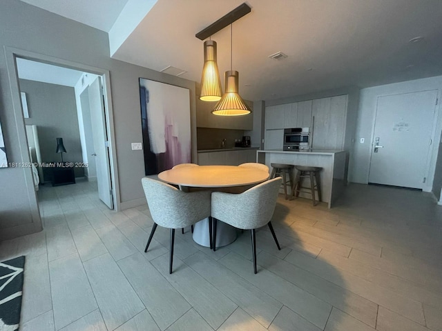 4010 S Ocean Dr Unit R1703, Hollywood, FL 33019 - dining room with light wood-type flooring