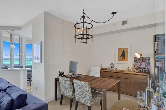 4779 Collins Ave Unit 4006, Miami Beach, FL 33140 - dining space featuring a chandelier