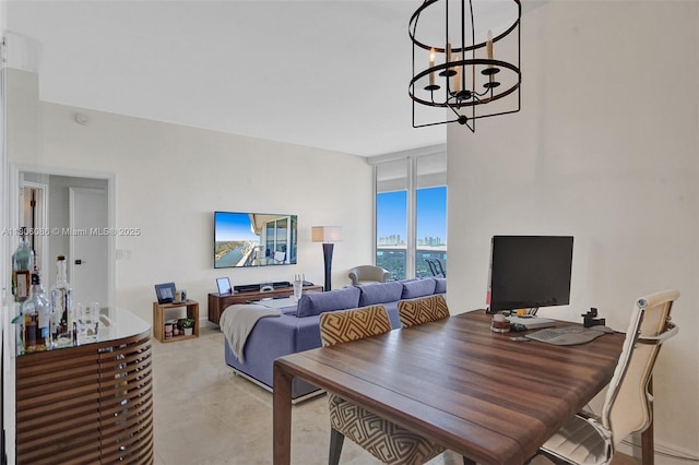 4779 Collins Ave Unit 4006, Miami Beach, FL 33140 - dining room featuring a chandelier