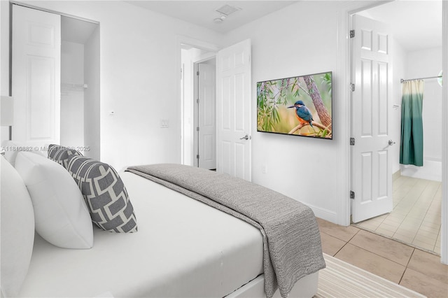 5342 SW 173rd Ave, Miramar, FL 33029 - bedroom featuring light tile patterned floors and baseboards