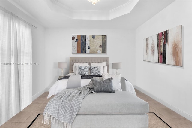 5342 SW 173rd Ave, Miramar, FL 33029 - bedroom featuring a tray ceiling, light tile patterned floors, crown molding, and baseboards